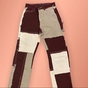 Patched neutral colored jeans
